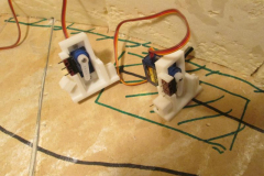 Close up of Tim Williams' 3D printed servo mounts on Insulation Lumber. Image © Tim Williams